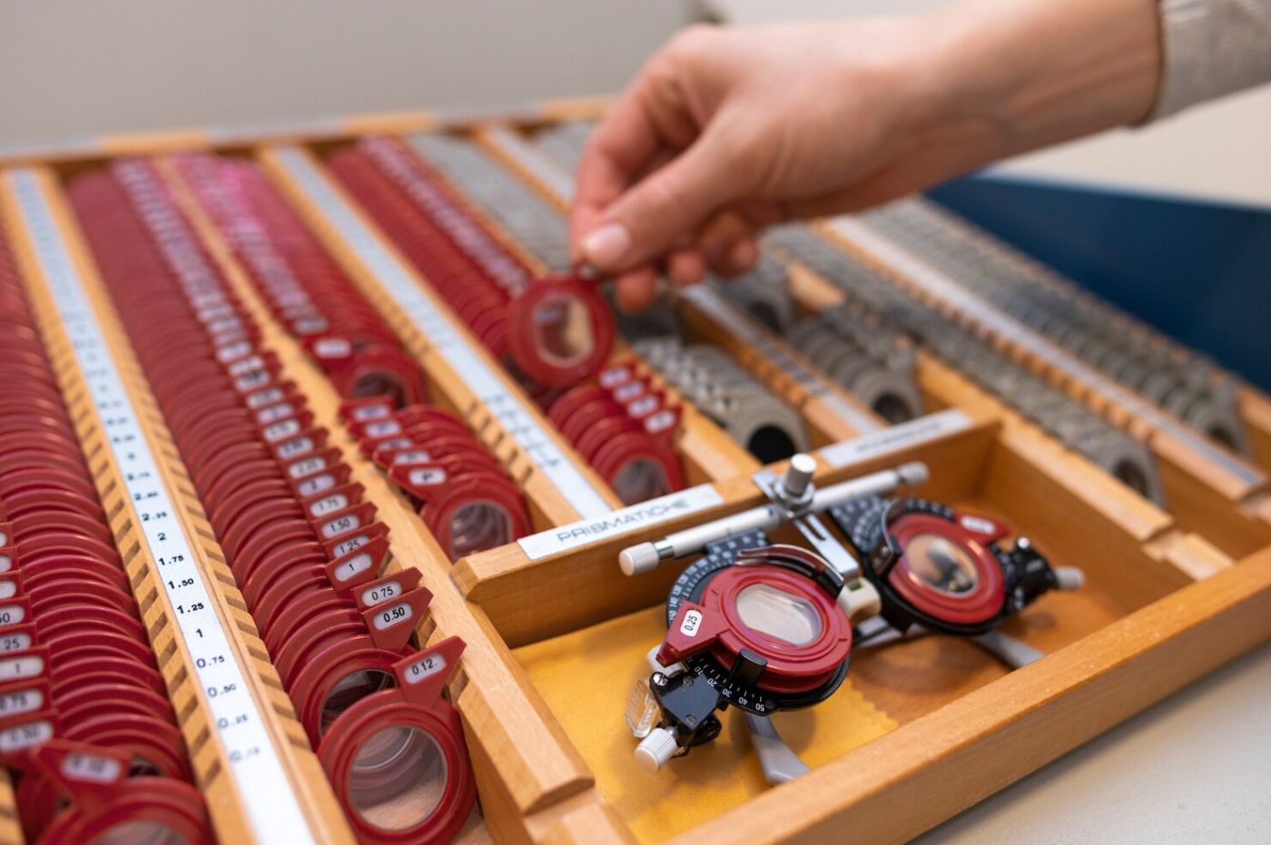 optometrist choosing lenses testing patient 23 2149230050 22965852